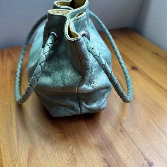 Susan Farber Collections turquoise bag with signature leather vintage